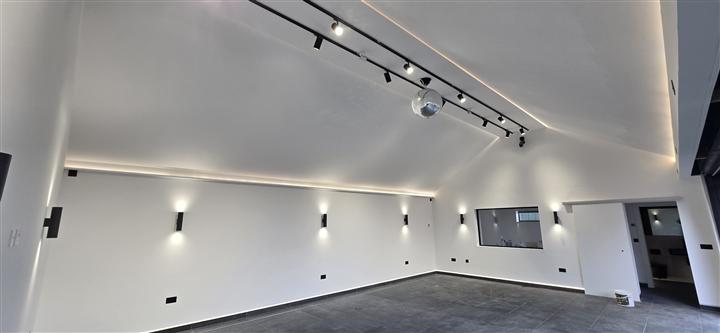 Track lighting, wall lights and LED cove lighting